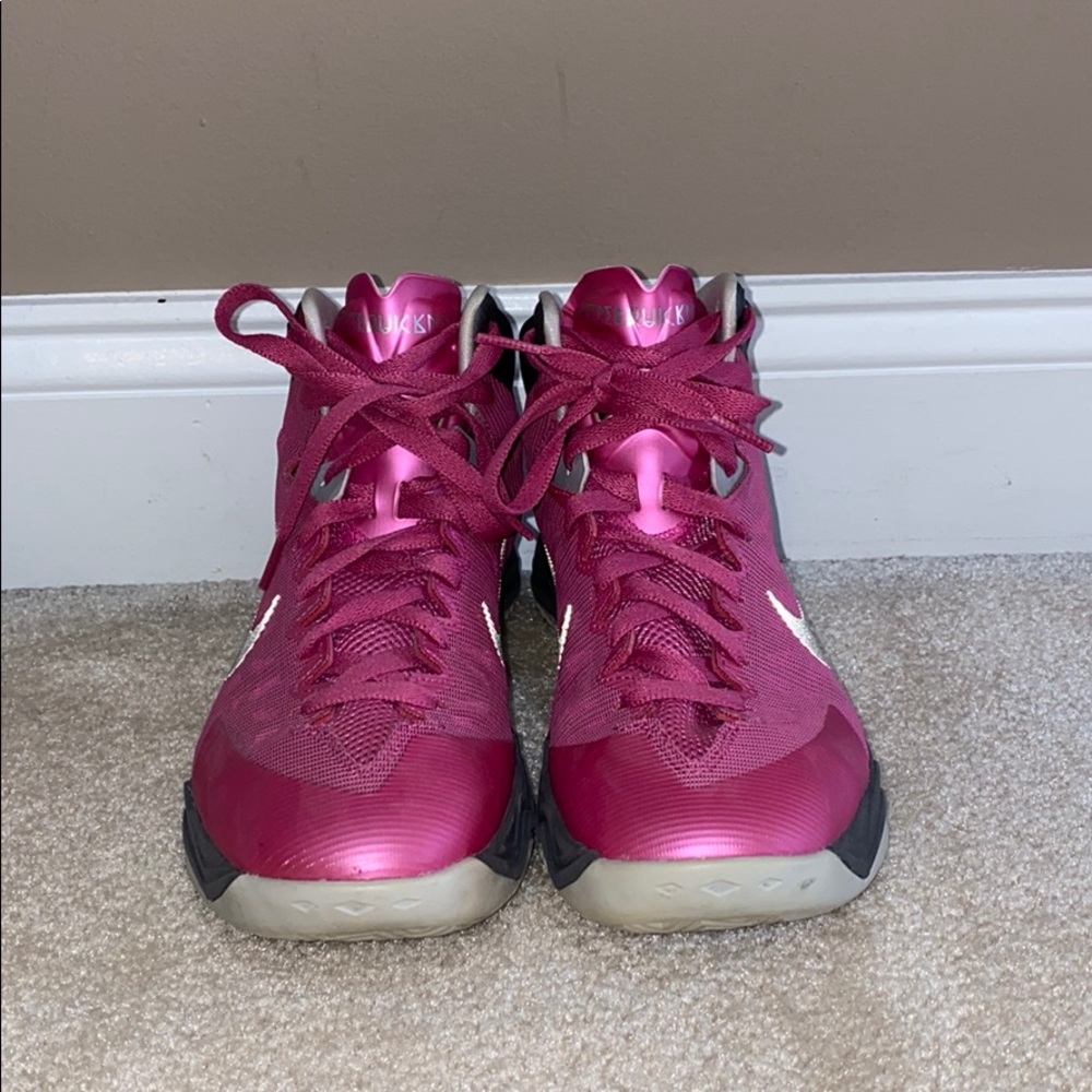 Pink Nike basketball shoes